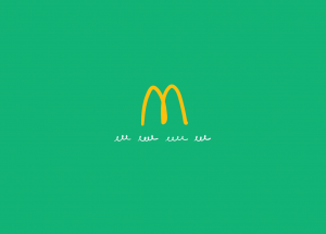 Ícone de M do McDonald's estilizado sobre fundo verde e linhas abaixo que representam o slogan da marca.